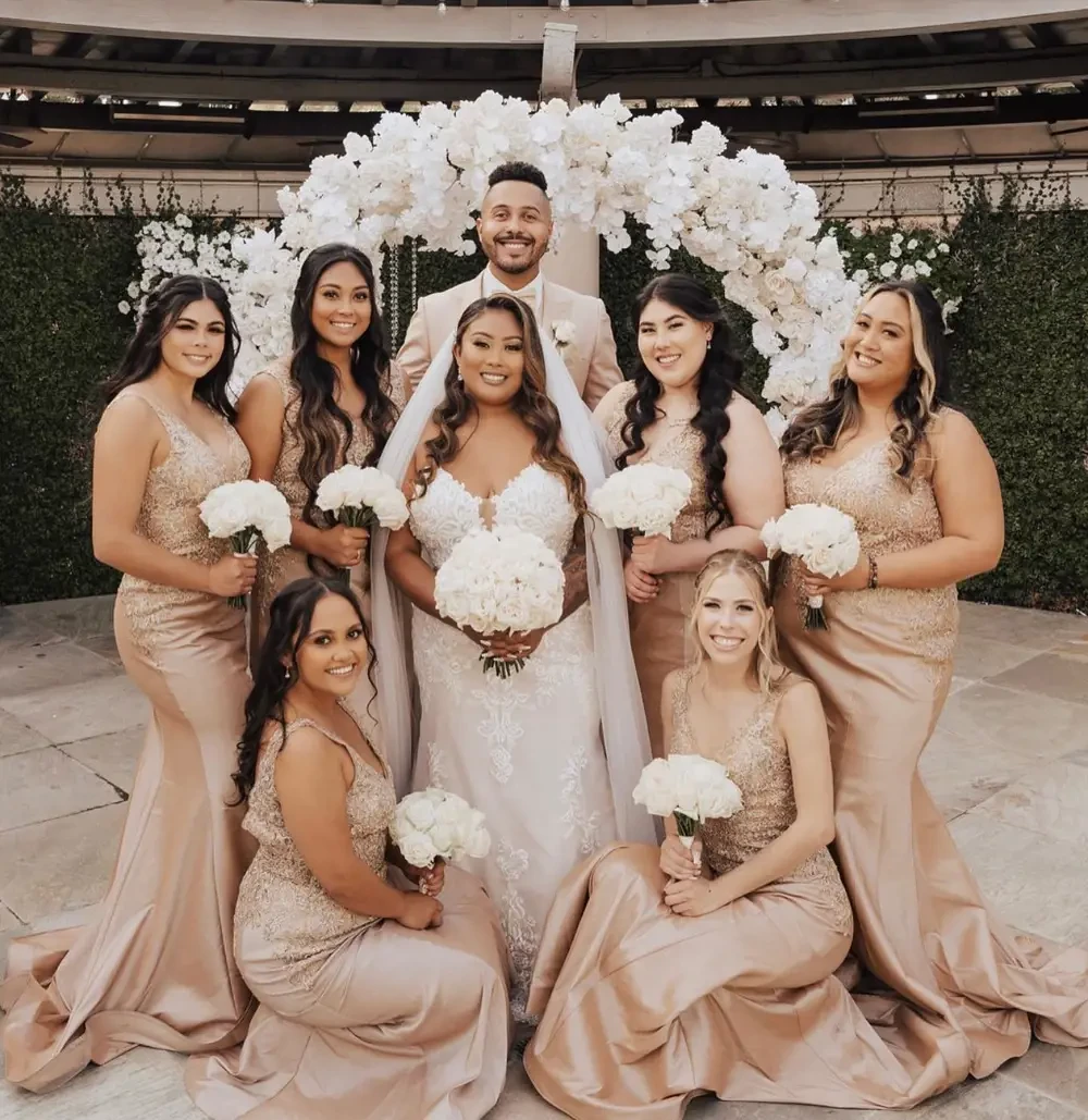 Models wearing a light-brown gowns