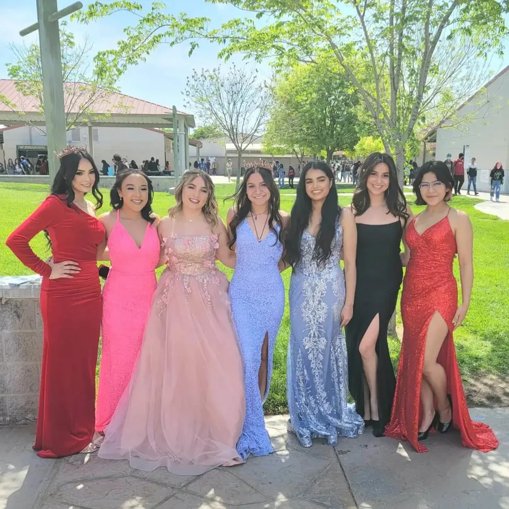 Models wearing a color dresses