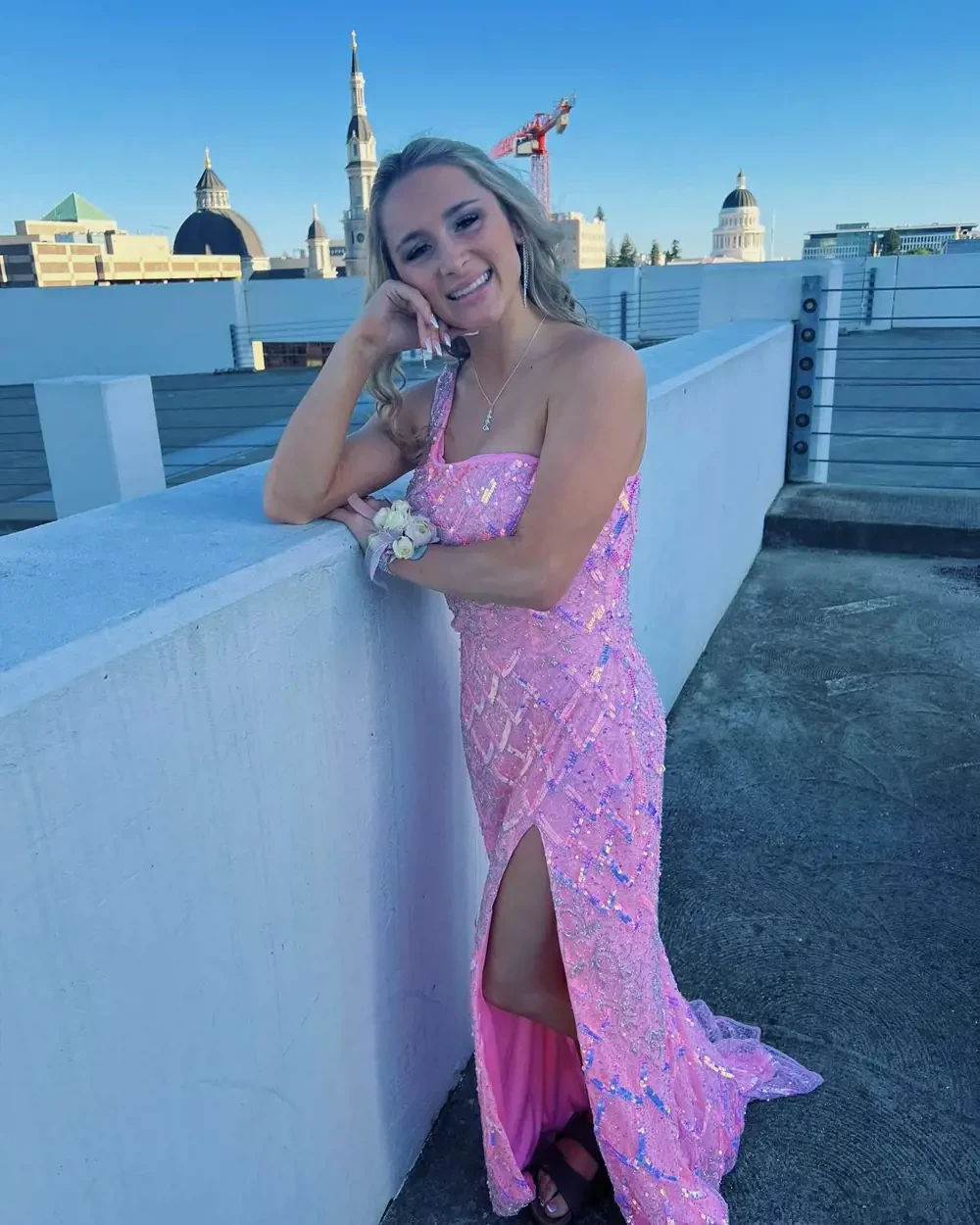 Model wearing a light-pink dress