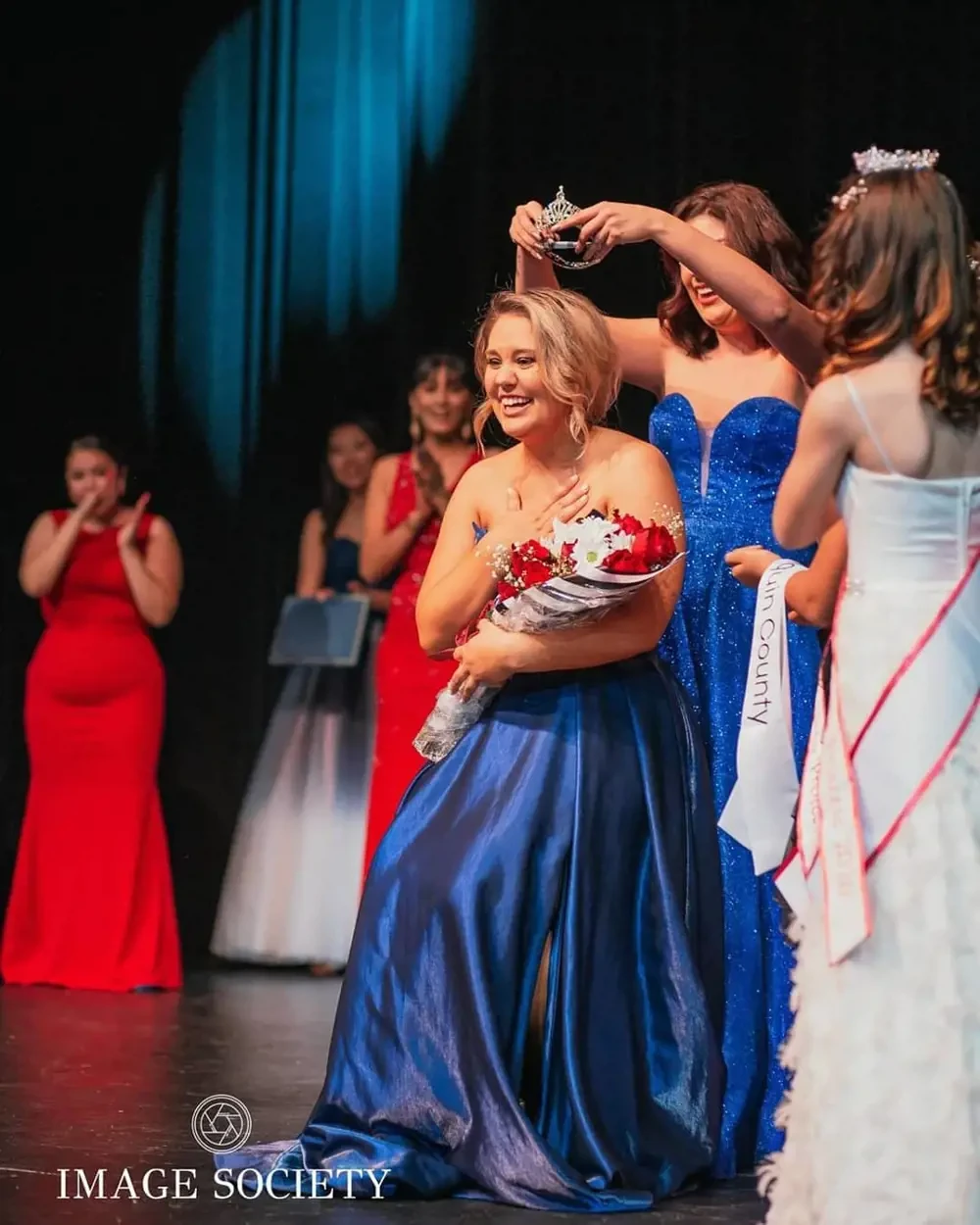 Model wearing a blue gown