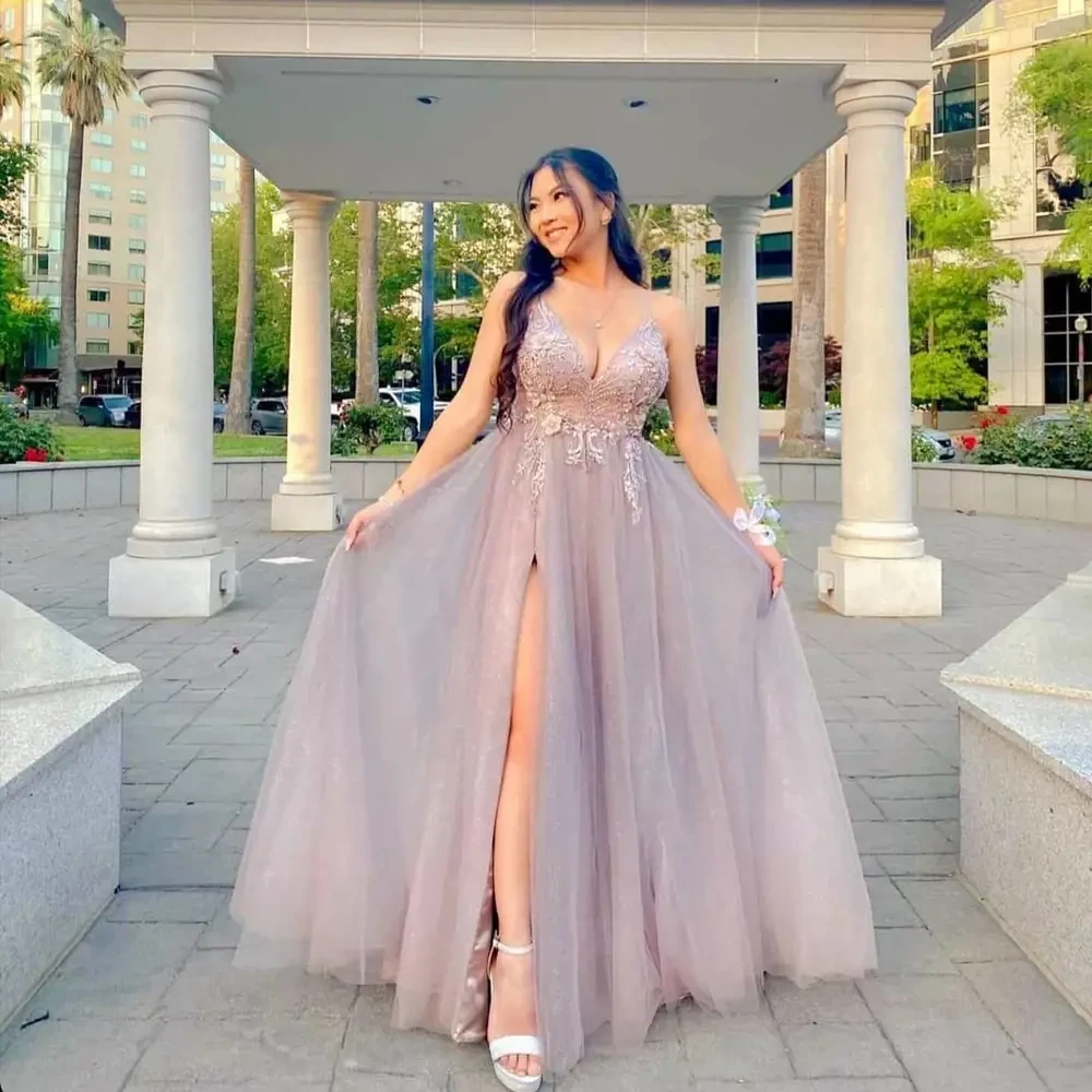 Model wearing a purple gown