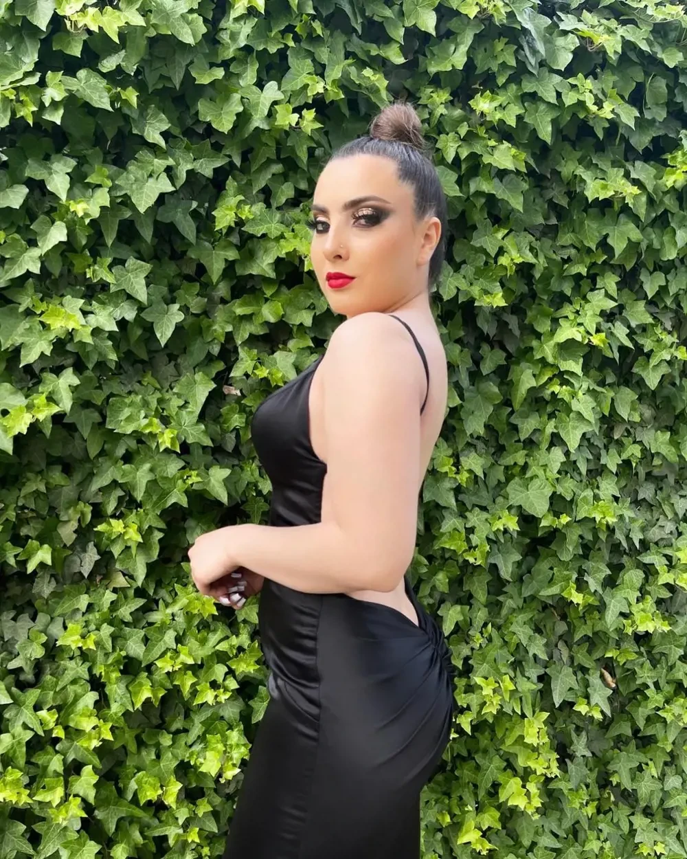Model wearing a black dress