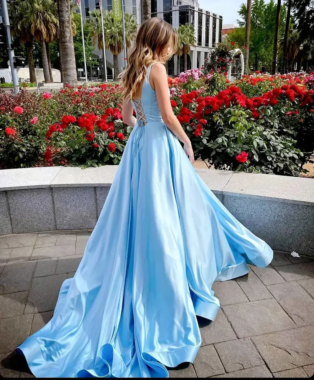 Model wearing a blue dress